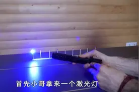 去公园打气球比较难，小哥教你一招，用激光一打一个准