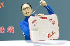 新年做新挂袋，挂在墙上或者门背后，上面用布拼了兔子和如意云视频封面