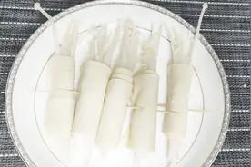1把金针菇，1张豆腐皮，一卷一烧，吃起来比肉都香视频封面