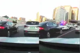 实拍：北京一捷豹司机遇堵车逆行超车 不料迎面撞见执勤警车视频封面