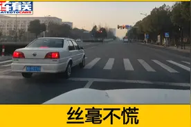 红灯时车身超过停车线，停在马路中间会被扣分吗，算不算闯红灯？视频封面