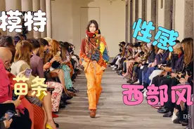 性感的欧美超模橘黄色的宽松长裤，个性时尚的上衣，花围巾好潇洒