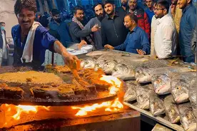 巴铁的海鲜之都，一种辛辣的秘制烤鱼，10里之外都是肉香视频封面