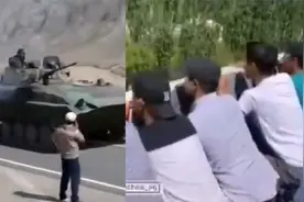 实拍吉尔吉斯斯坦交战场面：大量坦克开往前线，民众屋顶围观开火