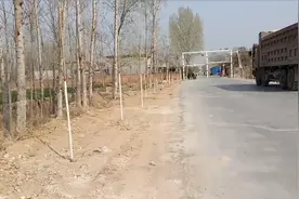 河南农村公路上设置限高杆，大车又该怎样通过？设置合理吗？