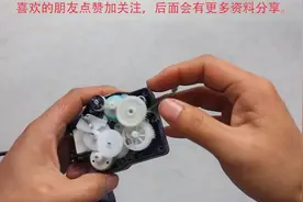 拆解洗衣机排水阀牵引器，看看内部结构，明白工作原理视频封面