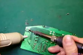 用电烙铁配合吸锡器更换电磁炉按键开关的全过程，新手值得一看！