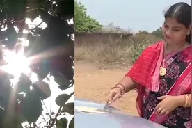 印度遭受极端高温，多地区超40摄氏度，一女子在汽车引擎盖上烙饼视频封面