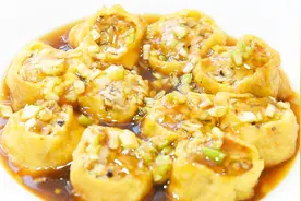 豆腐泡这样做更美味，搭配肉馅，鲜美多汁，满满一盘上桌不够吃！视频封面