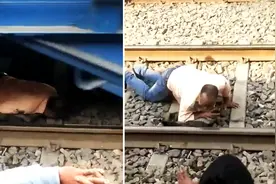 印度男子趴铁轨中间躲避疾驰列车视频封面