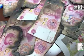 居民家中失火，6万现金被烧，银行兑换“火烧币”暖人心视频封面