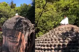 女子爬上乐山大佛头顶打坐！景区：禁止攀爬，已通知相关部门处理视频封面