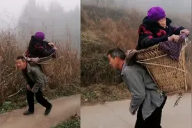 5旬男子背篓背80岁母亲进城看病，老人儿媳还备了暖水壶暖手视频封面