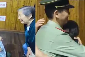 国庆节奶奶偷偷探望一年未见执勤孙子，因激动打不开手机错过合影视频封面