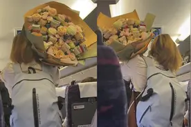 女生抱花坐高铁，重近30斤艰难扛肩上，看到花上一物众人慕了！视频封面