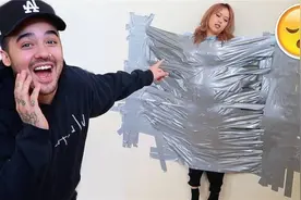老外尝试作死实验，把女友贴在墙上用胶带捆绑，简直无求生欲！视频封面