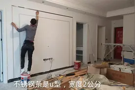 客厅8平米电视背景墙用不锈钢条制作，简单好看成本低，您喜欢吗视频封面