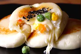 土豆学会这样做，孩子最喜欢了，不用面粉不发酵，咬一口满嘴拉丝