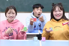 胖妞教学生折迷你小水杯，画上萌萌的表情，既可爱又能当收纳盒