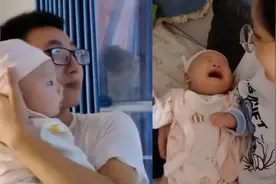 奶爸抱着3月大的儿子看对面邻居跳舞，妈妈关窗抱回儿子反应亮了视频封面