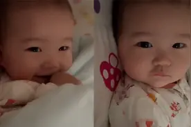 天使般的宝宝睡醒后不哭不闹，安静等妈妈醒来甜甜一笑，害羞捂头视频封面