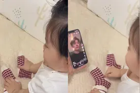 女宝宝看帅哥视频看到入迷，视频被滑走立马倔强滑回，网友爆笑视频封面