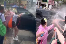 理想车主泼水节遭路人语音唤醒车门泼水，关门后再次拉开：已送修