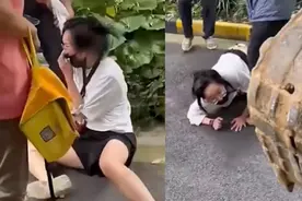 小区加装电梯，低层女业主不同意，现场阻止挖掘机施工遭强行拖拽视频封面