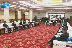 王忠林与中国邮政集团董事长刘爱力座谈