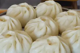 包子好吃做法真简单，不破皮不露馅，个个洁白蓬松又暄软
