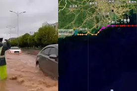 “苏拉”一天两次登陆广东:阳江降暴雨积水严重 民警蹚水疏导交通