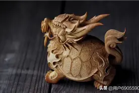 《龙龟》

黄杨木整料纯手工雕刻
规格：12×9.5×11.5cm图片