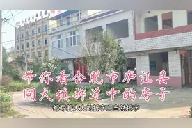 骑行安徽省合肥市庐江县发现同大镇有一条长长的街道为大学拆迁中