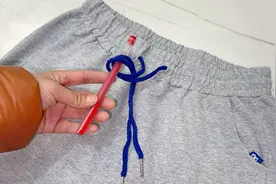 刚刚才知道，原来裤子上的2根绳子，要这样系才正确，长见识了