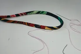 盘扣绳子的做法，非常的简单，利用一根针实用又漂亮。视频封面