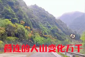 雨行湖南零陵到广西梧州的207国道上，叠连的大山变化万千
