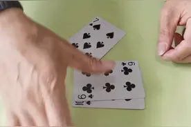 扑克牌魔术滑袖手法