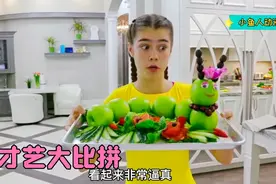 小萝莉用蔬菜、水果制作创意造型，还给老妈准备了早操视频封面