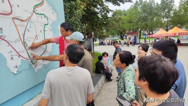 金寨梅山：一杯瓜片千份服务 “志愿红”擦亮双节旅游名片