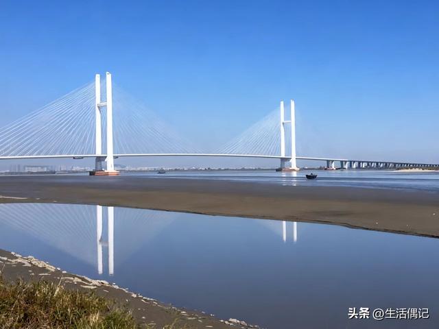 中朝新大桥通车有望，鸭绿江上再续桥梁传奇