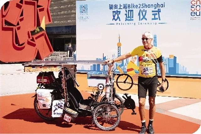公益骑行跨欧亚 沪上圆梦架心桥 比利时六旬抗癌勇士用车轮传递希望与绿色