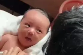 人类幼崽第一次看到奶奶的表情 网友：上辈子见过，没想到这辈子又遇到你了图片