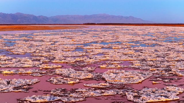 冬日奇观！落日流凌为黄河披上幻彩霓裳