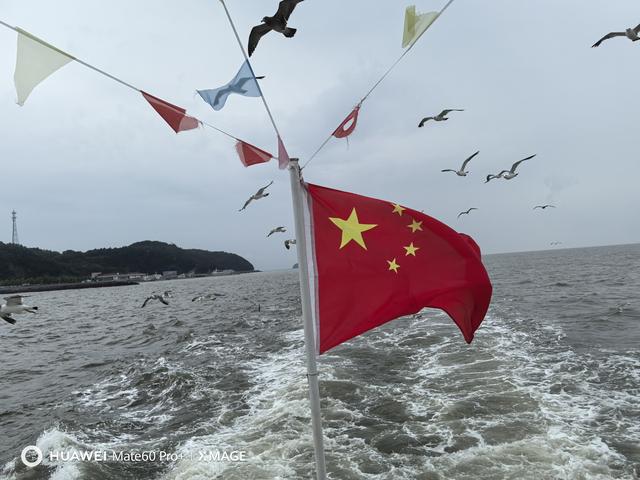 看獐岛海上日出起个“大早”，回沈阳路遇大雨赶个“晚集”