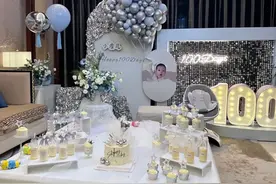 球球庆祝爱子百天 场景简单 大大方方不遮掩相貌 和爸爸长得一模一样图片