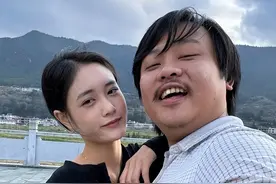 特意查了“飞猪夫妇”还真是真实的夫妻，女的长得漂亮，说像明星图片