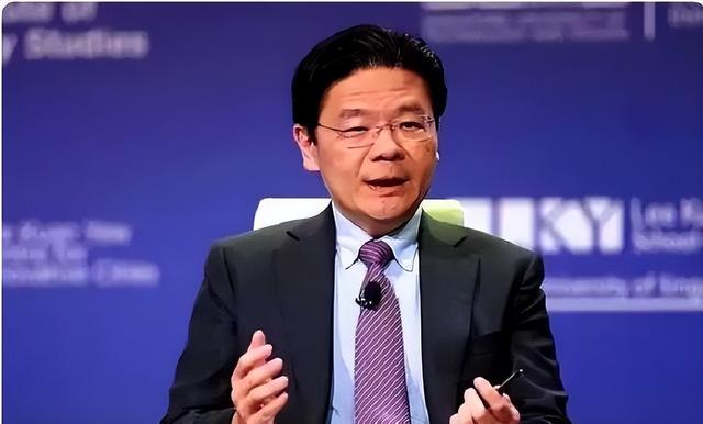 新加坡总理公开支持高市后，被罚18亿账单的金龙鱼，凉得更快了