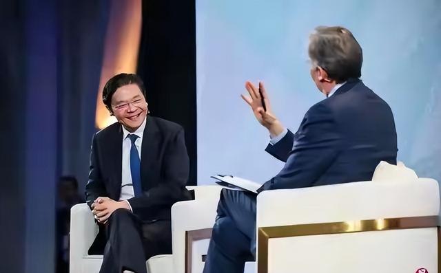 新加坡总理公开支持高市后，被罚18亿账单的金龙鱼	，凉得更快了