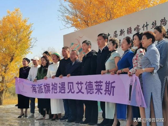 泽普县：艾德莱斯纹缀旗袍 胡杨林间续写深情