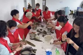 【网络中国节•端午】磨刀、理发、义诊……迎端午献爱心图片